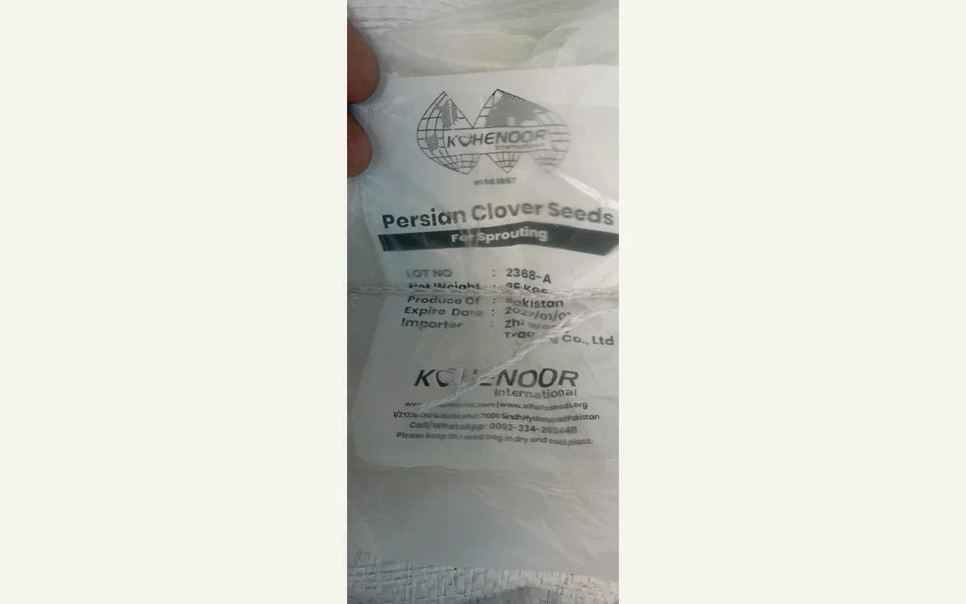 Kohenoor International Persian Clover Seeds export bag label showing lot number and Produce of Pakistan